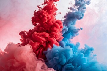 Fototapeta premium Vibrant red and blue ink clouds swirling in water
