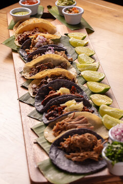 Taco platter with limes and salsa 