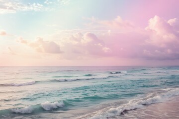 Fototapeta premium Pastel sky over gentle ocean waves at sunrise or sunset