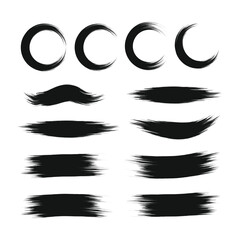 Collection of black ink brush strokes and abstract circular shapes © khairul