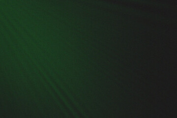 Dark green gradient fabric texture background with smooth folds and subtle light shading. Elegant abstract cloth pattern for modern design, presentation, or luxury backdrop use.