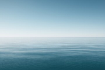 Obraz premium Calm ocean under clear sky.