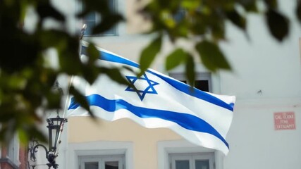 Israeli Flag Waving Proudly in the Wind - A Symbol of National Identity.