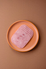 Meat, square ham sliced, organic food, protein for snacks. Sliced ham as a background