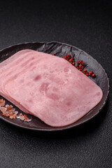 Meat, square ham sliced, organic food, protein for snacks. Sliced ham as a background