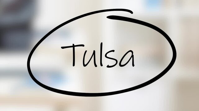 Tulsa Handwriting using black marker on glass