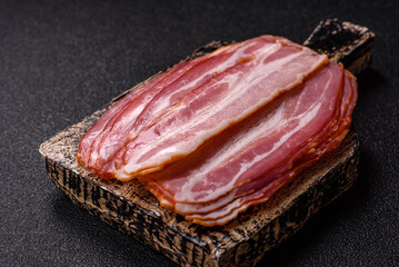 Meat, raw pork bacon sliced, organic food, protein for snacks. Raw bacon as a background