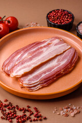 Meat, raw pork bacon sliced, organic food, protein for snacks. Raw bacon as a background