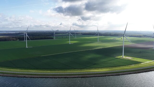 Aerial view on energy farm with wind mills generating sustainable green electricity in Flevoland, the Netherlands