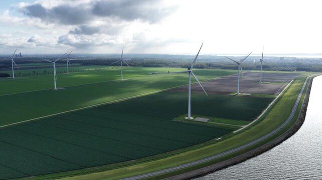 Aerial view on energy farm with wind mills generating sustainable green electricity in Flevoland, the Netherlands