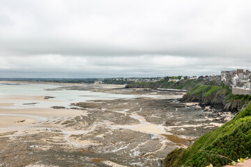 view from above of the beach at low tide