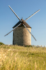 Moulin de Moidrey, view of an old mill built of stone, France, Pontorson 