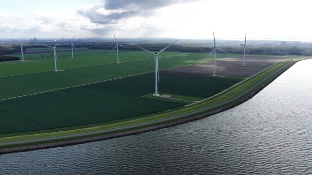 Aerial view on energy farm with wind mills generating sustainable green electricity in Flevoland, the Netherlands