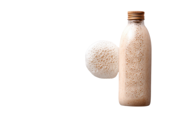 A clear bottle of creamy, frothy beverage and a separate fluffy foam cloud, isolated against a stark transparent background, emphasizing texture. background removed