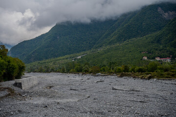 Dry river valley and forested mountains in Shaki, Azerbaijan