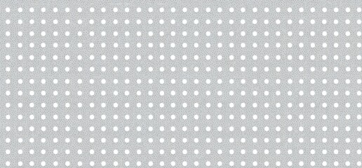 Polka dot pattern on textured light background