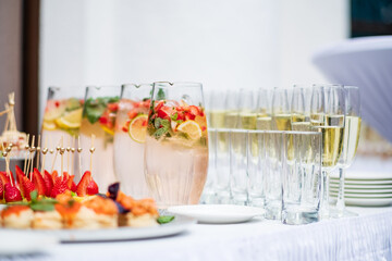 Colorful beverages and delicious treats await guests at this cheerful outdoor gathering