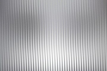 Obraz premium Modern silver background with vertical lines and subtle lighting effect for design