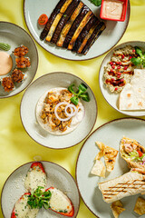 A colorful spread of dishes features fresh ingredients and delightful flavors to savor