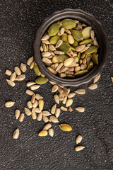 Seed mix sunflower seeds and pumpkin seeds natural product tasty snack fresh delicious gourmet food background on the table rustic top view copy space keto and paleo diet vegan and vegan food