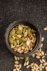 Seed mix sunflower seeds and pumpkin seeds natural product tasty snack fresh delicious gourmet food background on the table rustic top view copy space keto and paleo diet vegan and vegan food