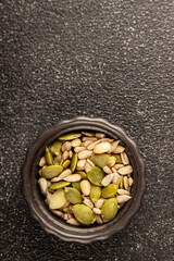 Seed mix sunflower seeds and pumpkin seeds natural product tasty snack fresh delicious gourmet food background on the table rustic top view copy space keto and paleo diet vegan and vegan food