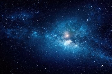 Naklejka premium Deep blue celestial view of a star-filled galaxy with a bright center