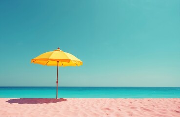 Fototapeta premium Bright yellow umbrella on pink sand beach under clear sky. Azure ocean water merges with turquoise sky. Summer scene features travel relaxation vacation paradise