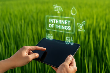 Farmer's hands holding a tablet displaying an internet of things (iot) dashboard for smart farming, showing icons like solar, water, plant, tractor, and growth charts