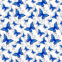 Beautiful blue butterflies on an openwork background.Vector seamless pattern with bright blue butterflies on a white background with colored lace.
