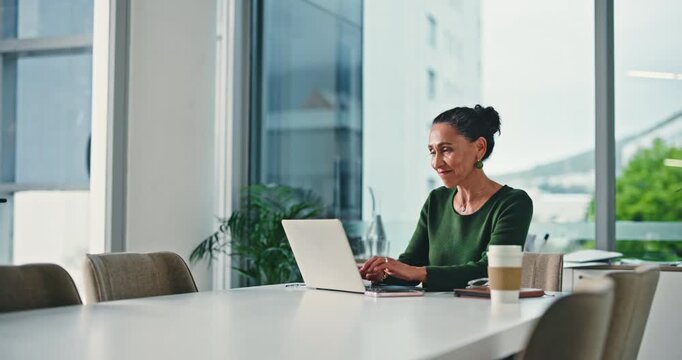 Typing, laptop and reading with business woman in office for planning, research and risk assessment. Life insurance agent, claims analyst and online liability report with mature employee in agency