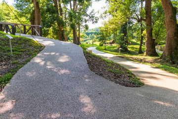 A path paved with small colored pebbles. Texture