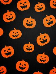 orange pumpkins on a black background create a festive halloween seamless pattern