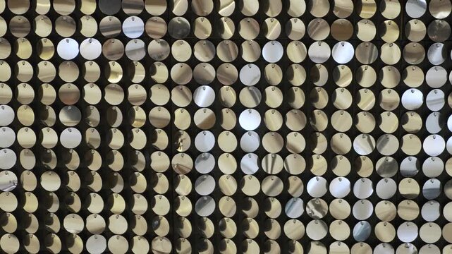 A dazzle of sequins shimmering and shining. Close-up shot