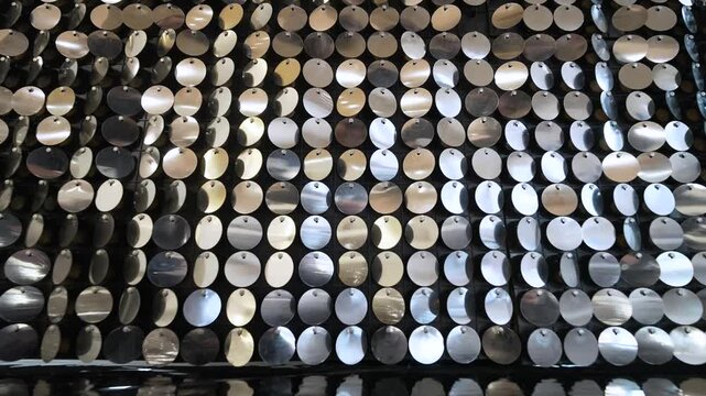 Glittering sequins shimmer and sparkle in close-up