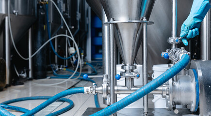 Industrial beer brewing process in a modern factory setting