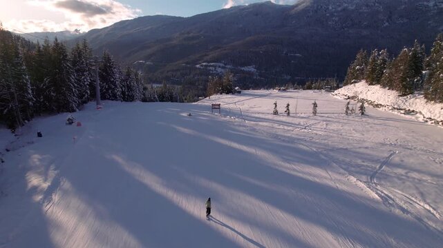 Skier snowboarder downhill ski mountain, Whistler mountain, snow, ski, winter sport, sunset. 4 24FPS