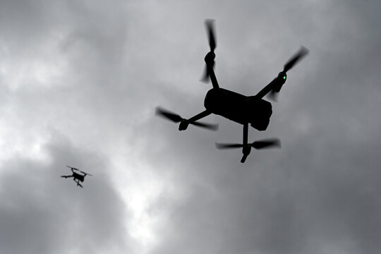 Drone is flying in the sky. Operator controls the drone.  War in Ukraine