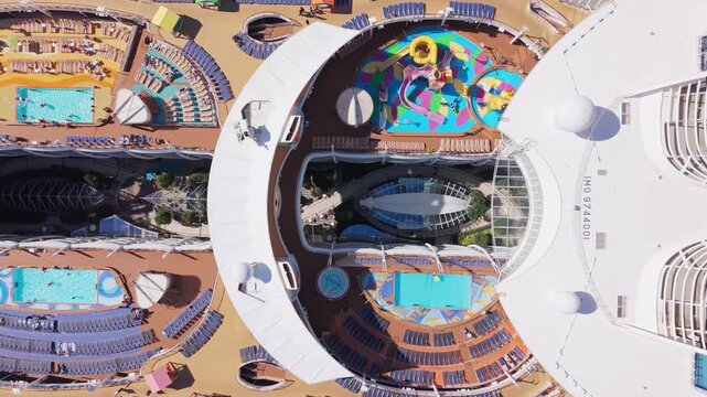 Top View From Above Of Cruise Tourists Lounging, Swimming, And Enjoying The Sun On Harmony Of The Seas Cruise Ship While Docked In Halifax, Nova Scotia.Maritime Canada.