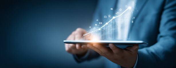 Businessman analyzing and assessing business data for long term investment growth goals and company finance balance, analysis of Digital marketing, CRM,Strategy, consultancy and planning of targets.