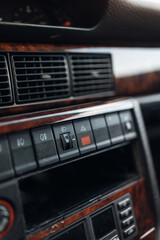 Obraz premium Headlight adjustment at old car panel inside