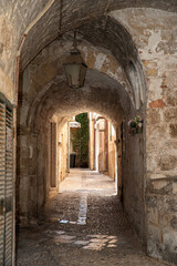 Stone vaulted passage with lantern
