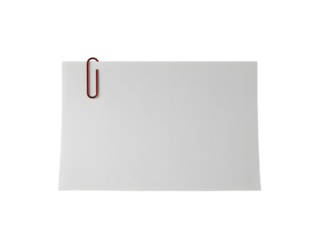 Blank white paper note held by a single red and silver metal paperclip against a stark black background