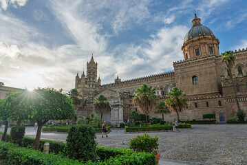 Fototapeta premium Palermo, the historic Sicilian capital city, featuring the monumental city gate, Palermo Cathedral, ornate baroque architecture, and charming narrow streets filled with history, Sicily, Italy