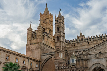 Palermo, the historic Sicilian capital city, featuring the monumental city gate, Palermo Cathedral, ornate baroque architecture, and charming narrow streets filled with history, Sicily, Italy