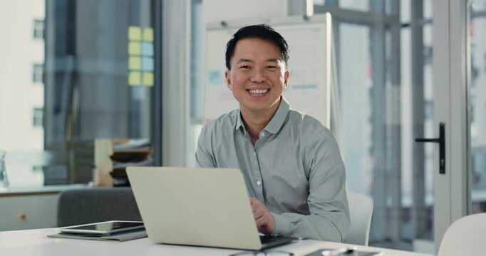 Face, business and Asian man with laptop in office for research, career pride and financial report. Portrait, male person and about us with pc, review budget and schedule update on investment funding