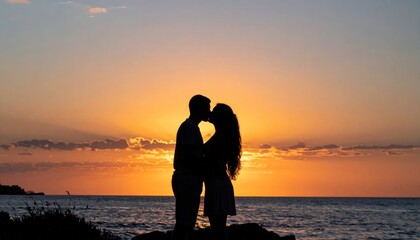 Romantic couple silhouette embracing at seaside at sunset, suitable for love, relationships, wedding, togetherness, honeymoon, coastal romance, travel and beach vacation themes