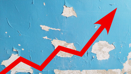 Red growing up arrow on Peeling painted background. Old home. Cracked blue paint on room wall. House repair. Housing service. Plaster. Damaged. Poverty concept. conservation. Texture. Crisis. Tariff.