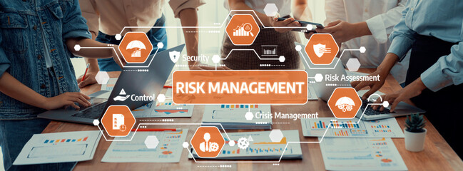 A dynamic scene of professionals collaborating on risk management strategies, showcasing teamwork and analytics in a modern business environment. Perfect for corporate themes. Amity