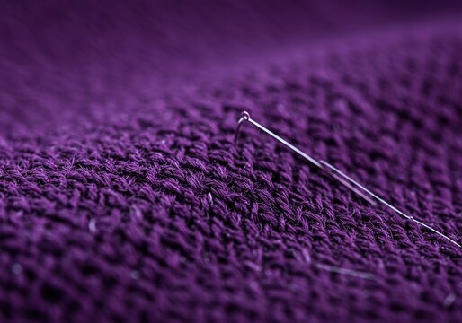 Close-up of intricate purple embroidery stitches on fabric, showcasing traditional textile art and delicate needlework design and texture ,rich ,embroidery ,close-up